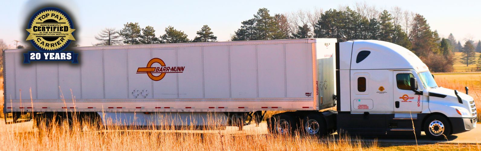 Barr-Nunn Truck with company facts and Top Pay Certified Carrier logo
